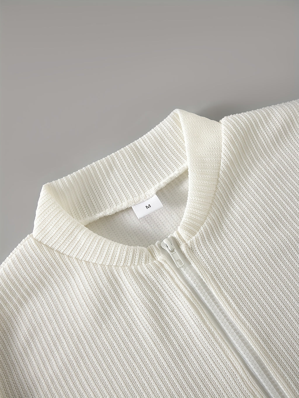 Cas | Pull zippé