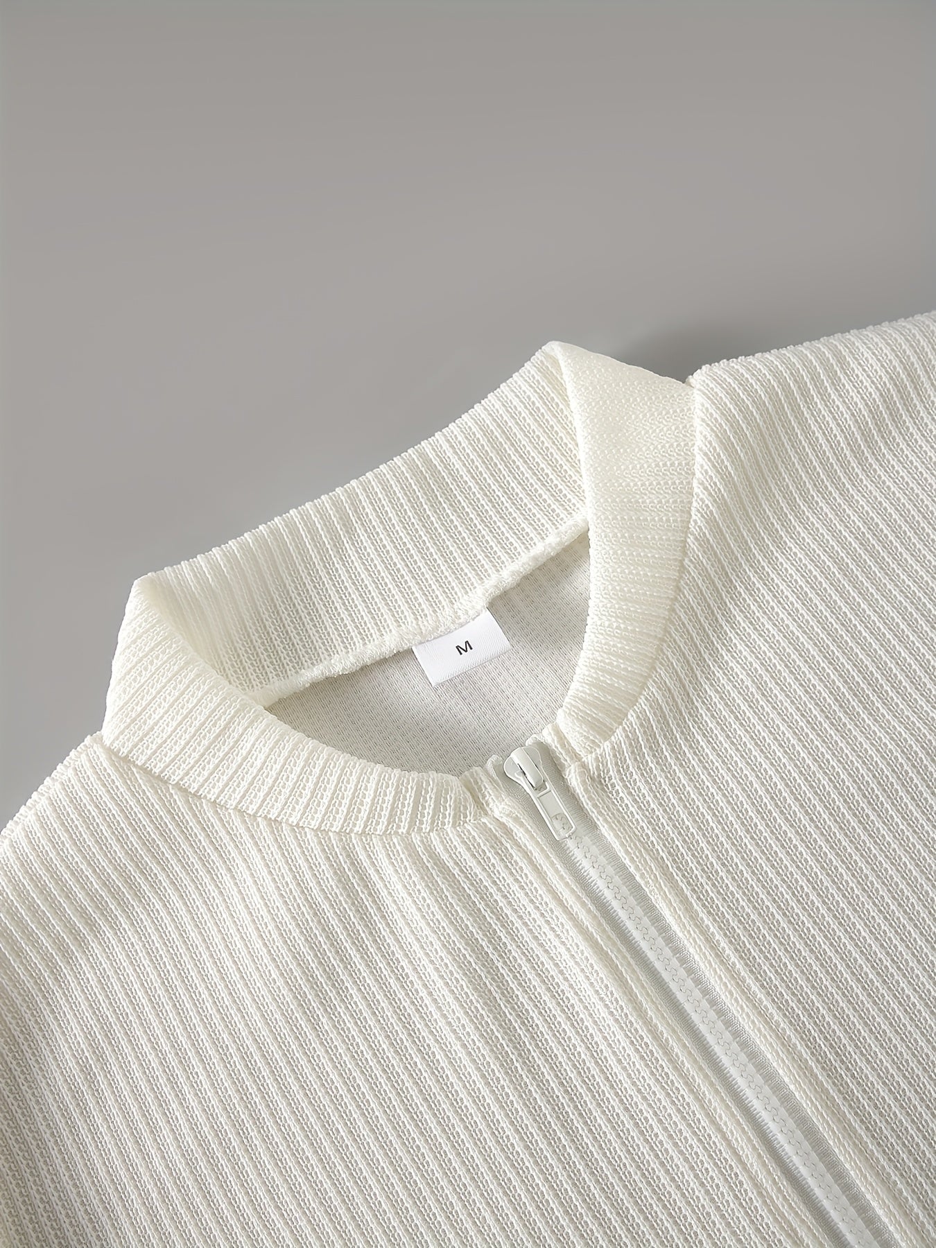 Cas | Pull zippé